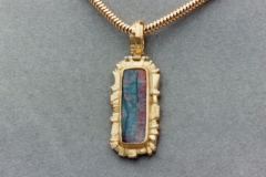 Opal and gold pendant0