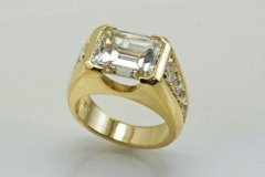 Gold Ring with Emerald Cut Diamond