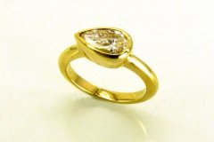 Gold Ring & Pear Shaped Diamond